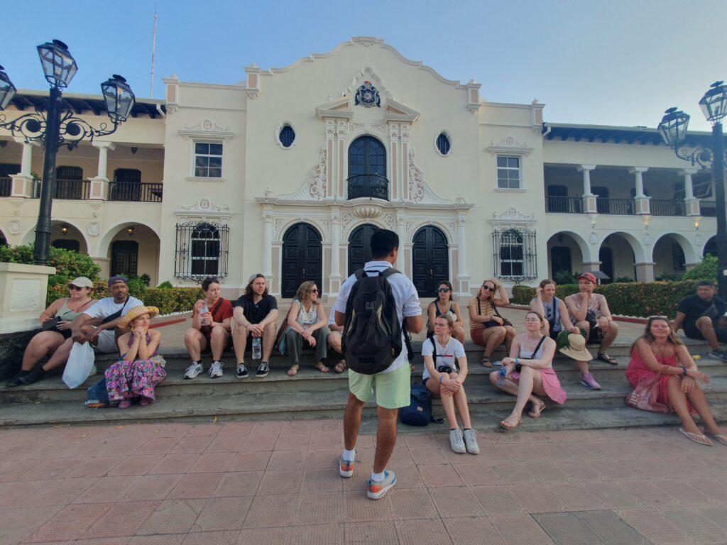 Tourguide explaining about the university in Leon Mono Loco Adventures