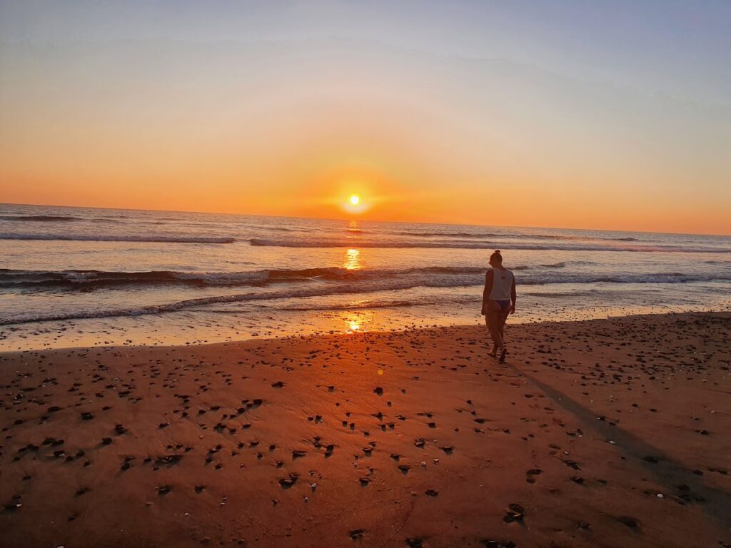 Sunset at the beach in Poneloyo