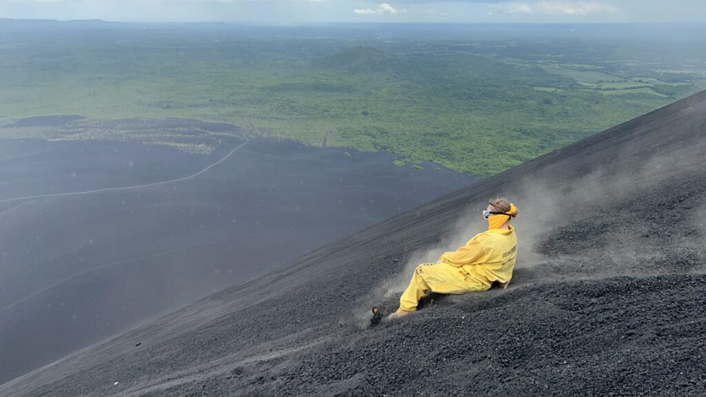 Sliding down the Cerro Negro volcano in Nicaragua