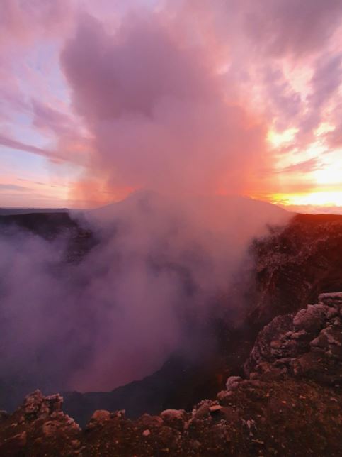 Watching the lava during the Masaya Volcano Sunset Hike with Mono Loco Adventures